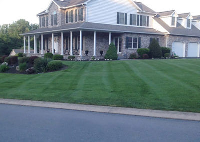 Home and Mowed Lawn