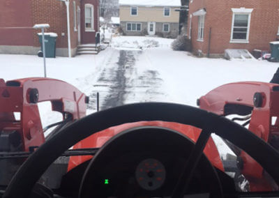 Tractor Plowing Driveway